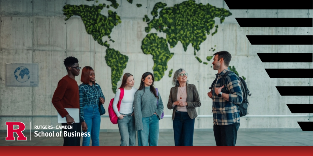 Groups of professional students standing in front of a world map